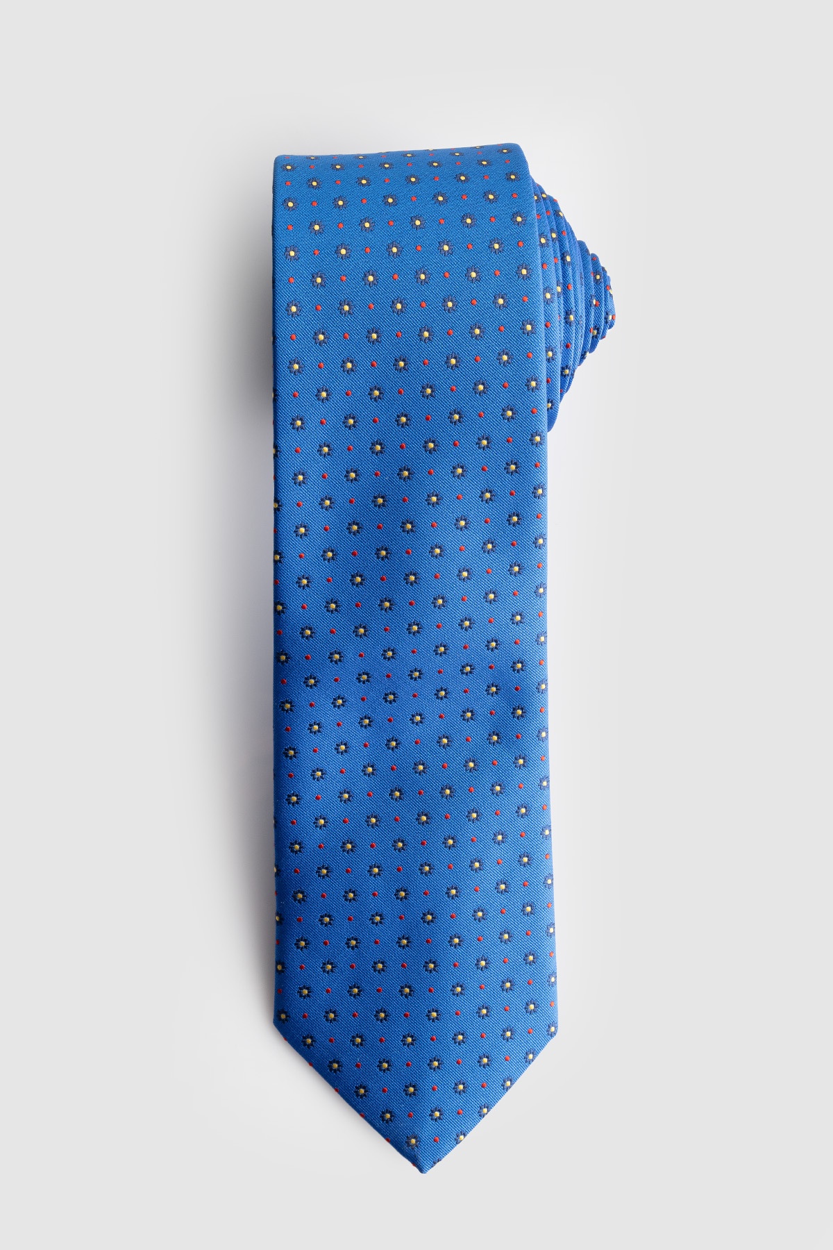 Királykék színű apró virágmintás klasszikus nyakkendő