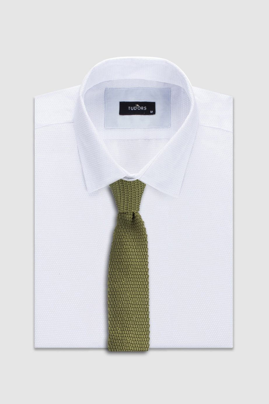 Zöld színű kötött vékony nyakkendő