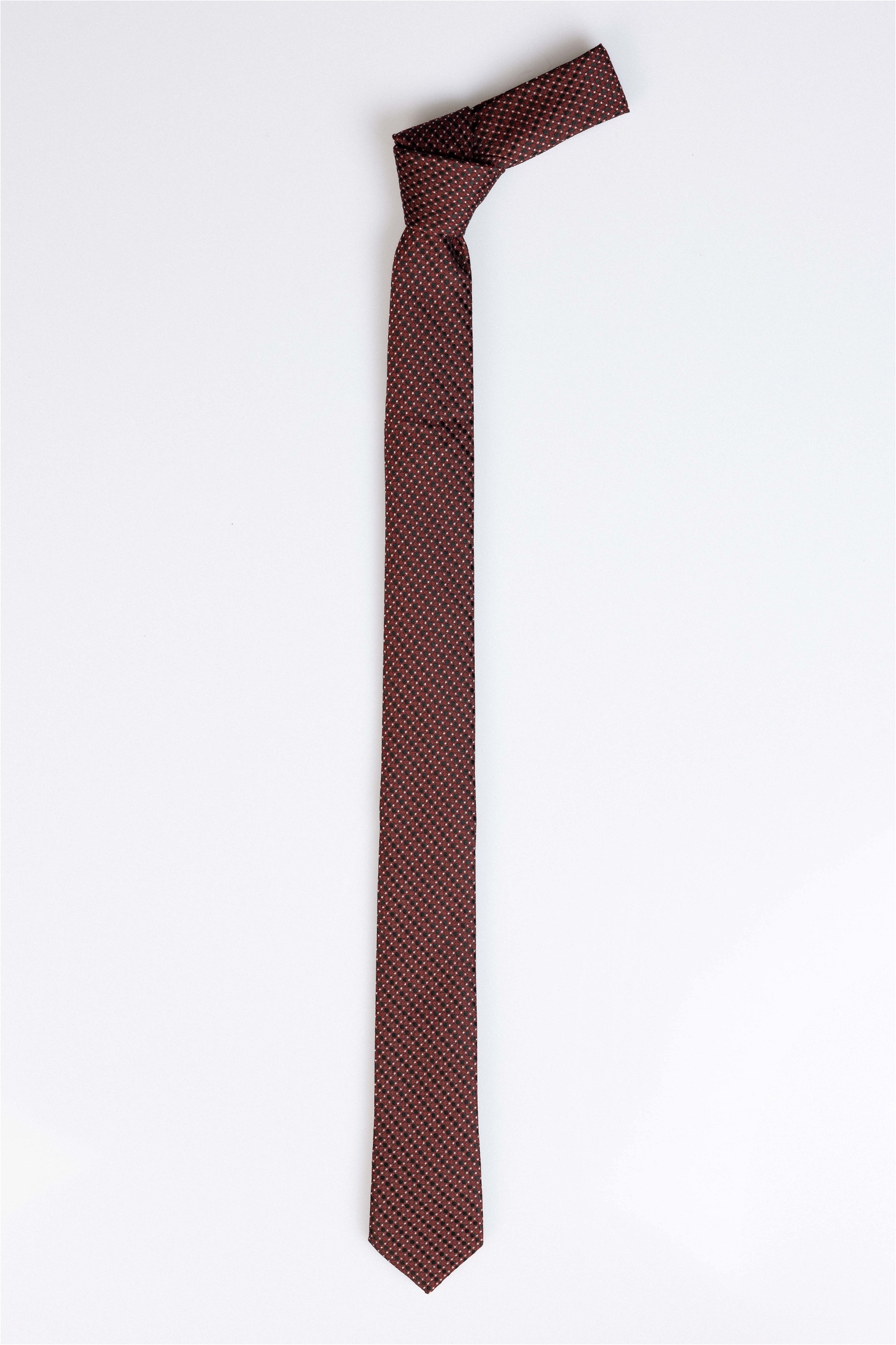 Pöttyös anyagában mintás kötött nyakkendő